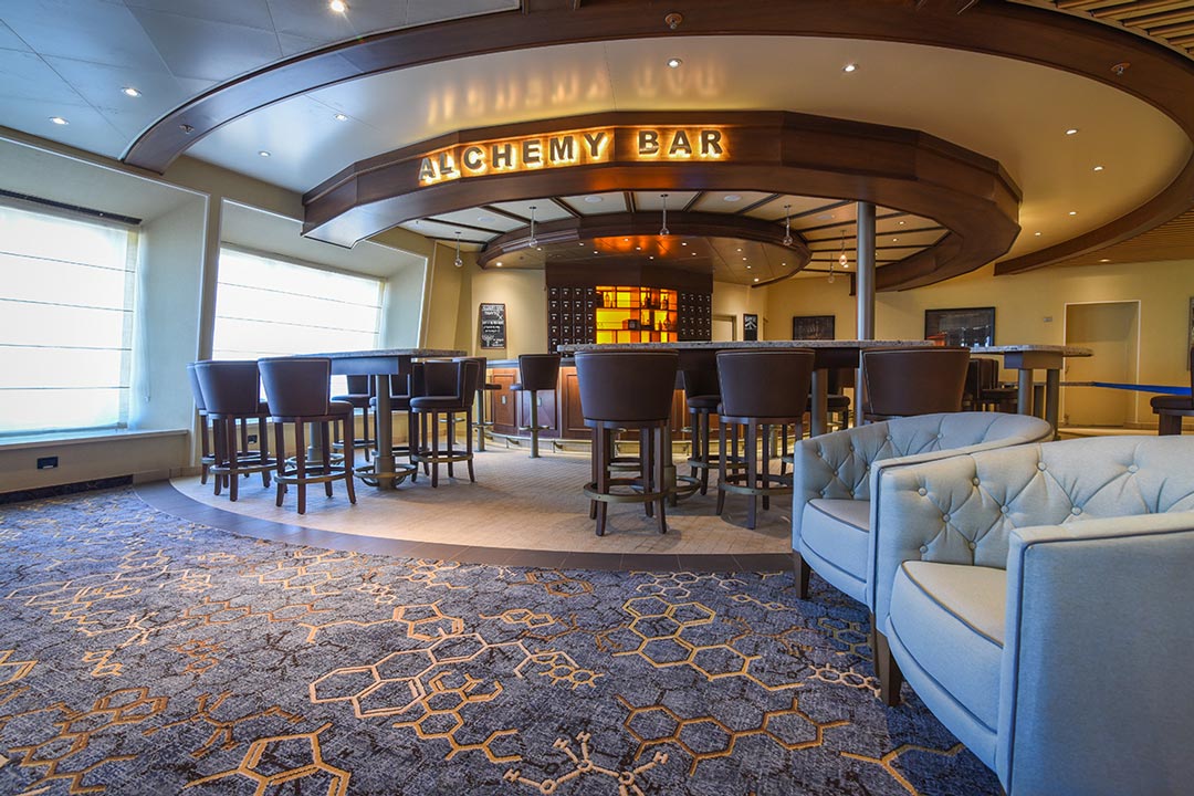 Aft dining room with hunting/fishing lodge-like decor on walls